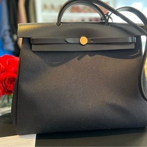 Brand new never used Hermes Herbag 39.  Hard to find black on black color!